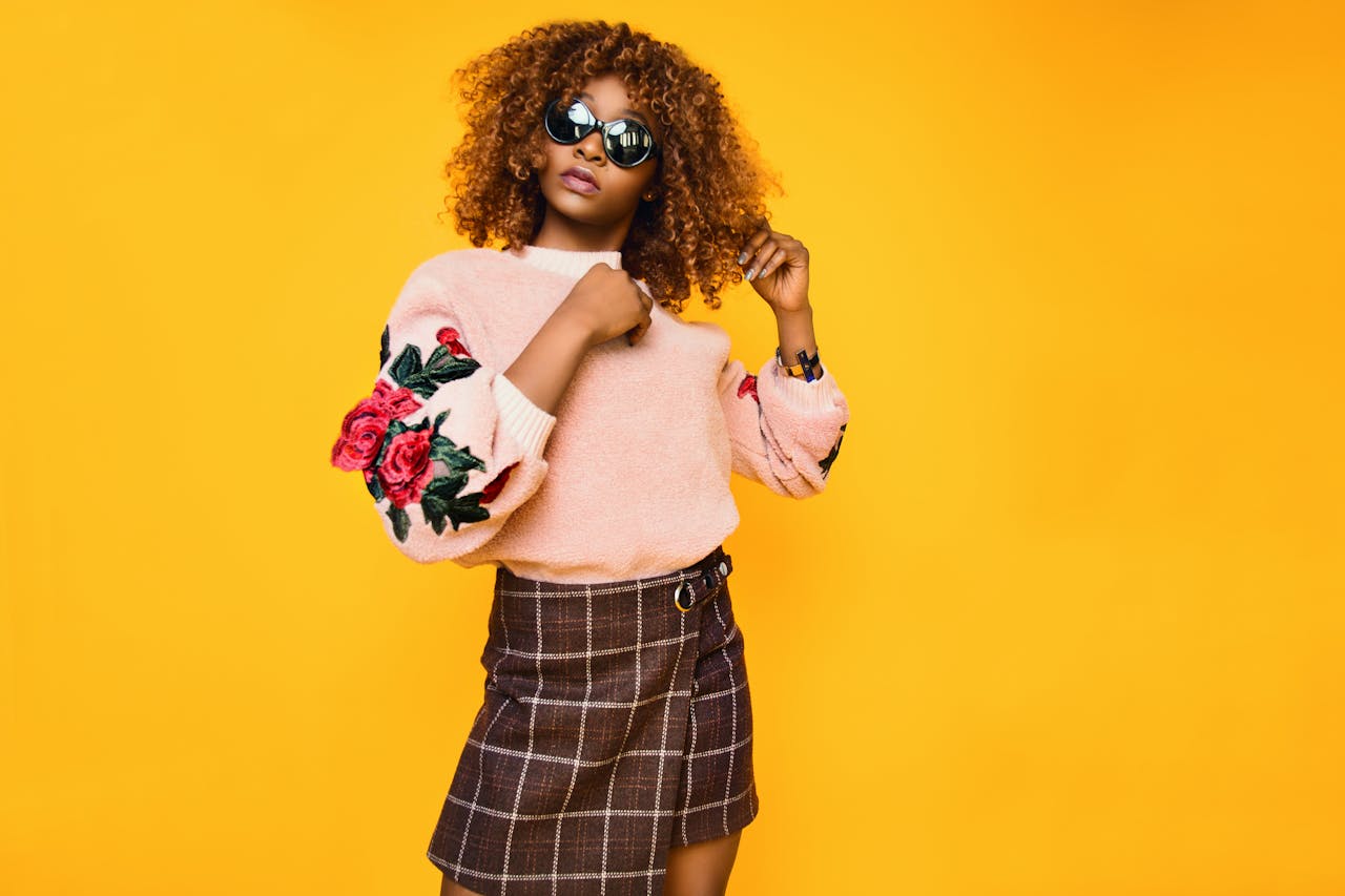 Women's Pink Sweatshirt and Brown Plaid Skirt